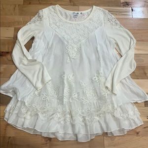 Ladies cream tunic. True to size  30” long